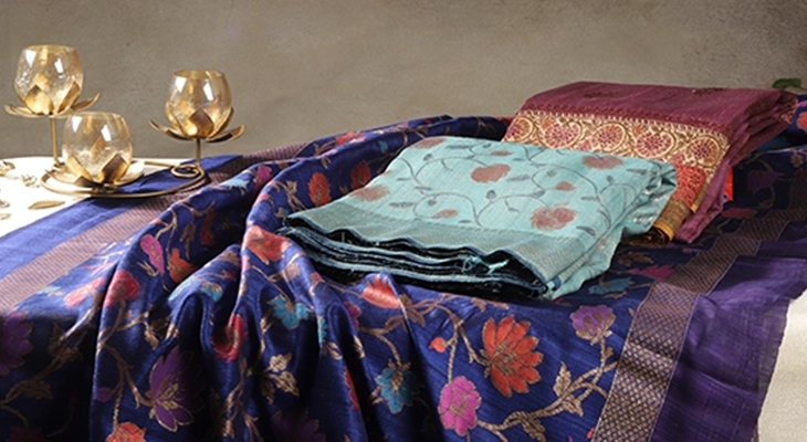 Elegant handwoven silk sarees with intricate motifs, ideal for festive and special occasions.