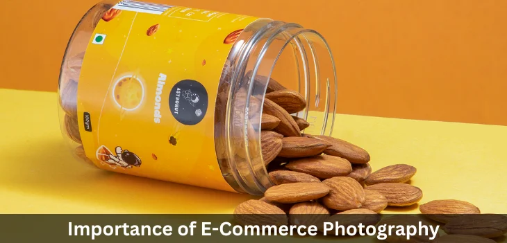 The depiction of almonds spilling out of a clear container on a yellow backdrop is flawless.