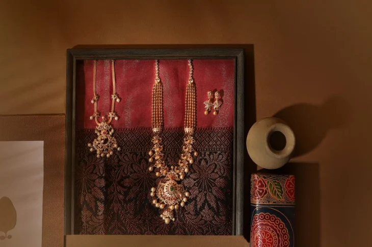 A full set of a necklace, haram & earing with elegant design fits perfectly in frame captured by talented photographer